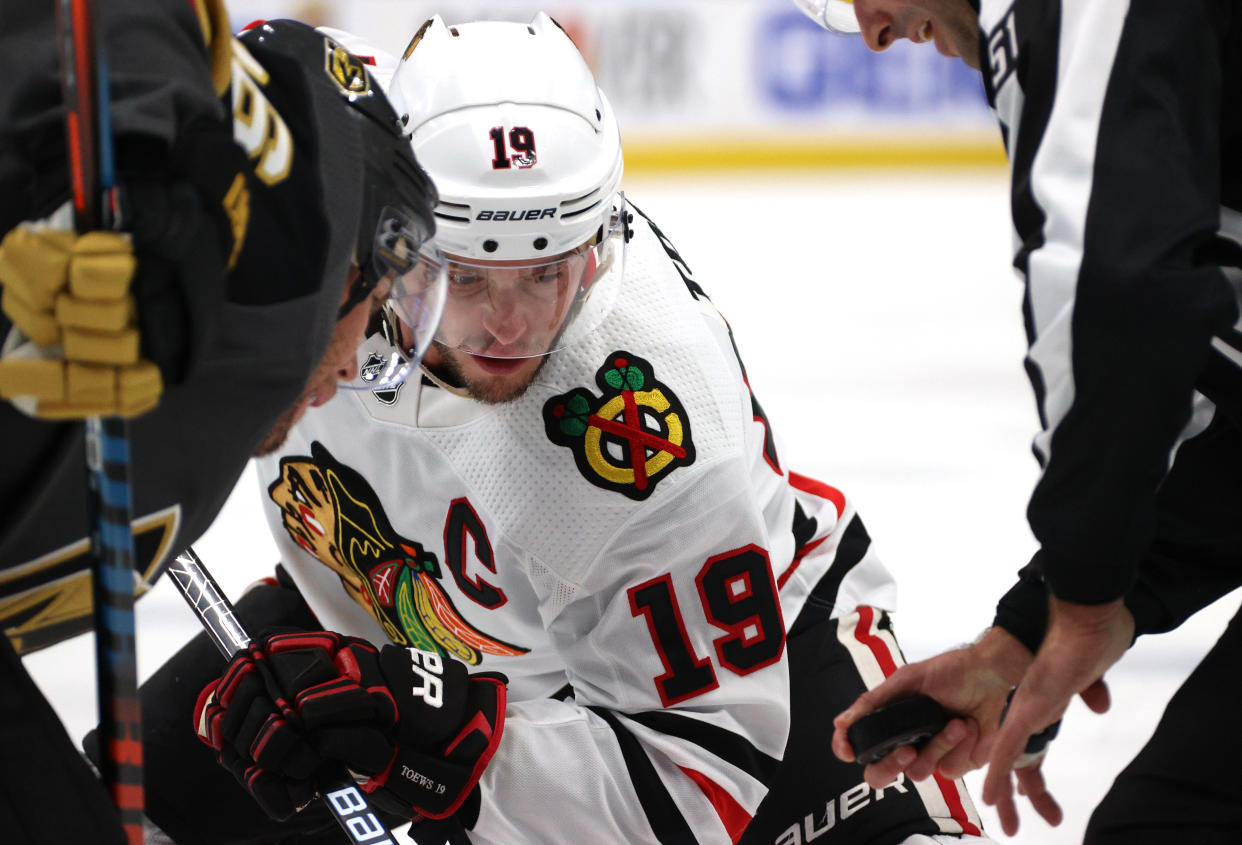 EDMONTON, ALBERTA - AUGUST 18: Jonathan Toews #19 of the Chicago Blackhawks faces off with Paul Stastny #26 of the Vegas Golden Knights during the first period of Game Five of the Western Conference First Round of the 2020 NHL Stanley Cup Playoff at Rogers Place on August 18, 2020 in Edmonton, Alberta. (Photo by Dave Sandford/NHLI via Getty Images)