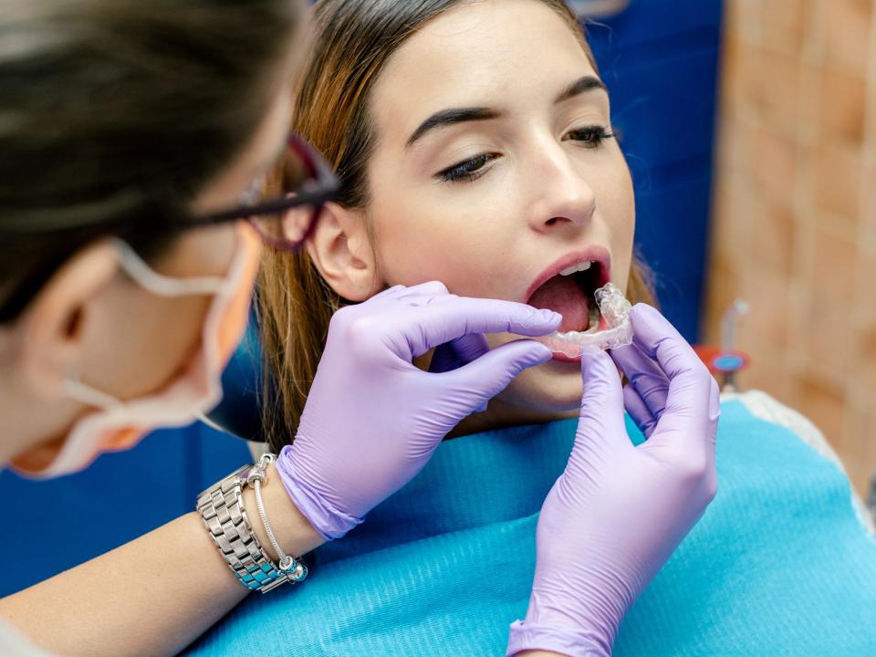 woman getting invisalign