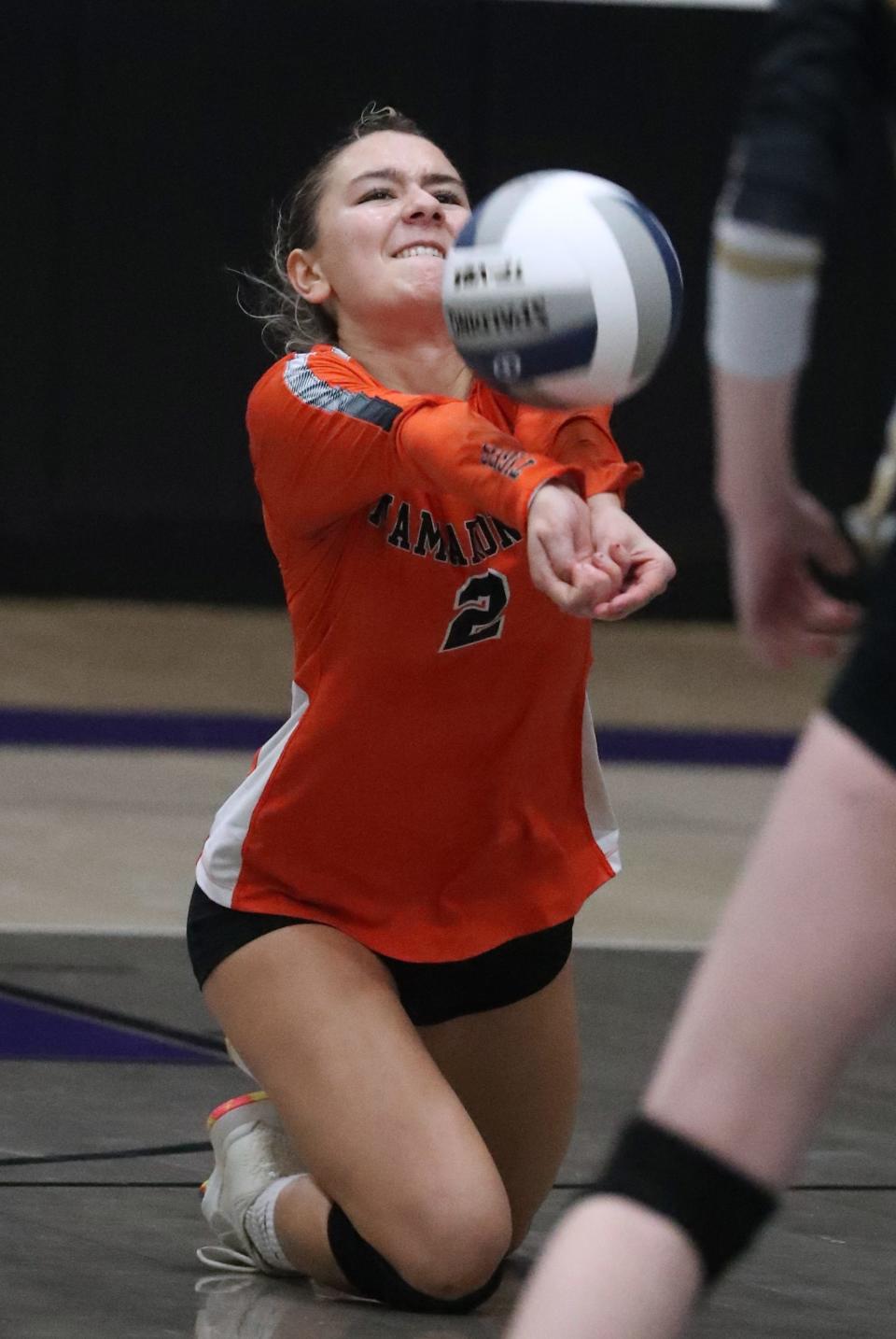 Mamaroneck's Harper Chinn digs the ball during a Class AA state regional final with Corning at John Jay Cross-River Nov. 11, 2022. Corning won 3-1.