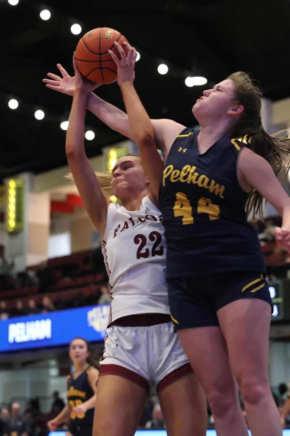 Albertus' Julia Scott grabs a rebound away from Pelham's Taylor Green during their Class AA Girls Semifinal at the Westchester County Center Feb. 26, 2024. Albertus won 68-32.