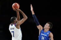 United States's Kevin Durant (7) shoots over Czech Republic's Jan Vesely (24) during a men's basketball preliminary round game at the 2020 Summer Olympics, Saturday, July 31, 2021, in Saitama, Japan. (AP Photo/Charlie Neibergall)