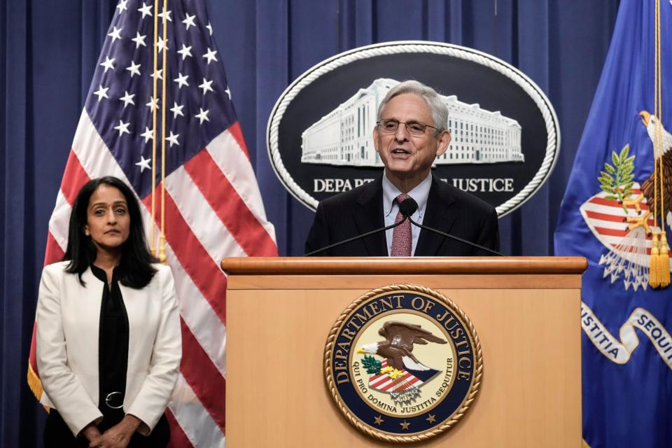 Associate Attorney General Vanita Gupta looks on as U.S. Attorney General Merrick Garland speaks during a news conference at the U.S. Department of Justice on Tuesday. Garland announced that the U.S. Department of Justice has filed a lawsuit seeking to block Idaho's new abortion law.