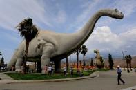 <p>The Cabazon Dinosaurs were not a set from <em>Pee-wee’s Big Adventure,</em> but are in fact a real tourist attraction right outside of Palm Springs in California. With an exhibit including more than 50 dinosaurs, guests can climb inside some of the dinosaurs too!</p>