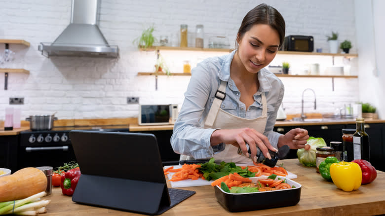 woman using cooking app