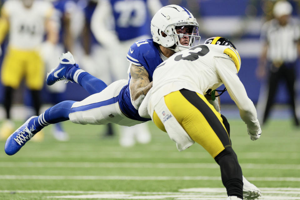 Damontae Kazee, right, left Michael Pittman Jr. concussed with this hit. (Andy Lyons/Getty Images)