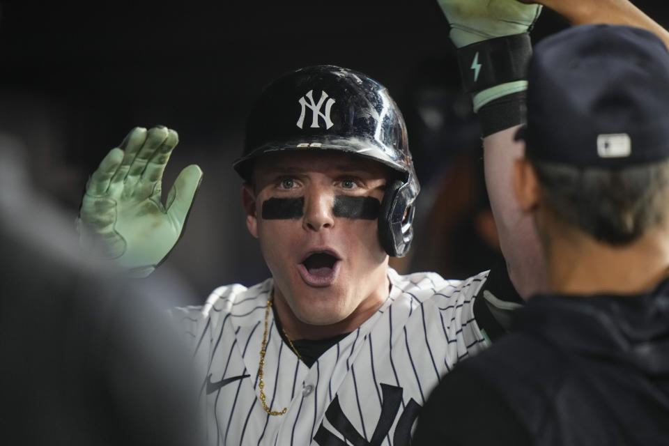 New York Yankees' Harrison Bader celebrates with teammates after hitting a three-run home run during the eighth inning of a baseball game against the Baltimore Orioles, Monday, July 3, 2023, in New York. (AP Photo/Frank Franklin II)