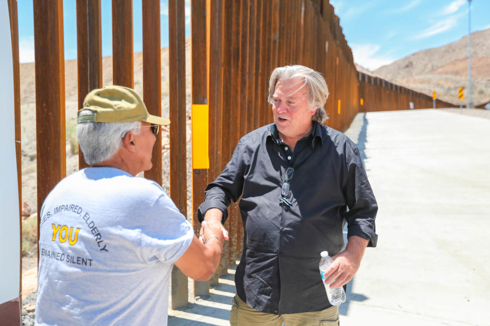 Steve Bannon vistis with a fan at the Symposium at the Wall: Cartels, Trafficking and Asylum near a privately built border wall in Sunland Park, New Mexico, constructed by the WeBuildTheWall organization on American Eagle Brick Co. property on Saturday, July 27, 2019. (Photo by Nathan J Fish/Sun-News via Imagn Content Services, LLC/USA Today Network/Sipa USA)