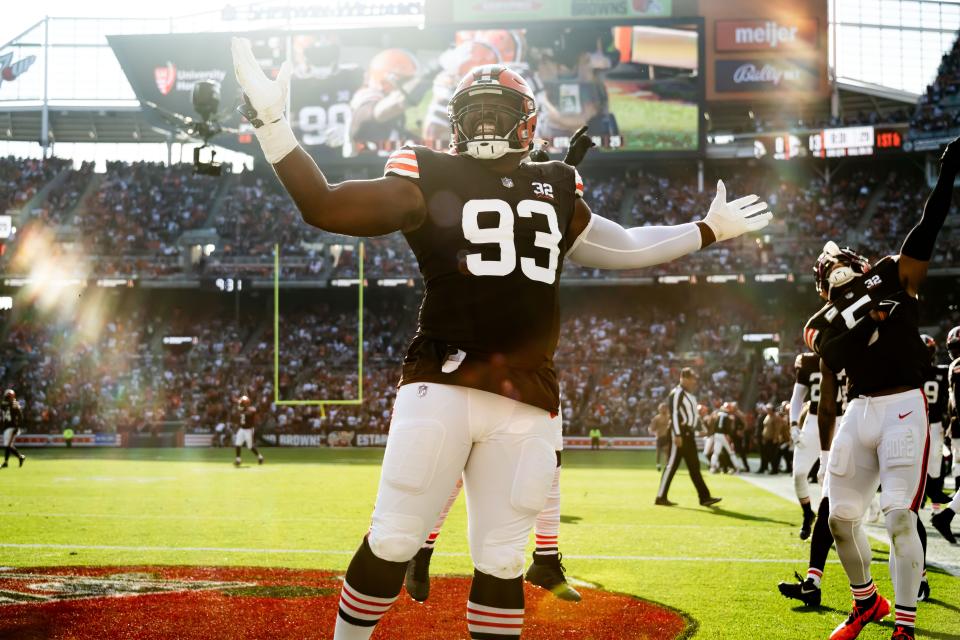Cleveland Browns defensive tackle Shelby Harris (93) celebrates after a strip sack of Arizona Cardinals quarterback Clayton Tune (not pictured) Sunday in Cleveland.