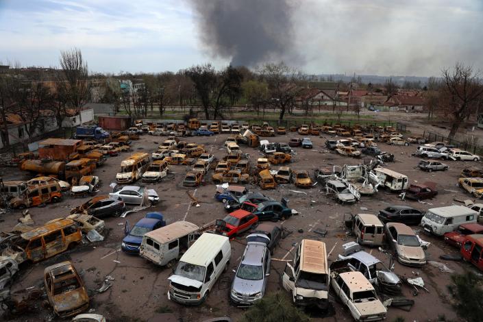 Damaged and burned vehicles fill a lot in a destroyed part of the Illich Iron &amp; Steel Works Metallurgical Plant, as heavy fighting continues nearby, in an area controlled by Russian-backed separatist forces in Mariupol, Ukraine, April 18.