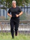 <p>David Harbour goes for a jog in N.Y.C. on Thursday as he prepares for <em>Stranger Things </em>season 4. </p>