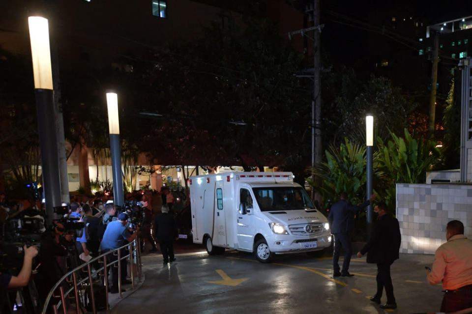 An ambulance transporting Brazil's President Jair Bolsonaro arrives at the Vila Nova Star Hospital, in Sao Paulo, Brazil, on July 14, 2021. - Bolsonaro is suffering from an 