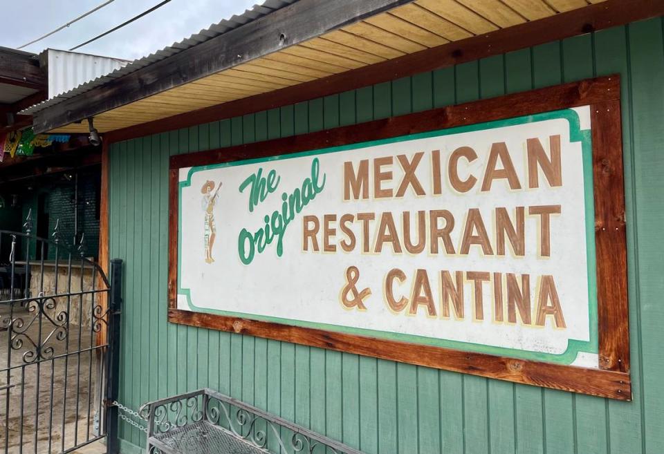 A faded sign on the back of The Original Mexican Restaurant in Fort Worth March 25, 2023.