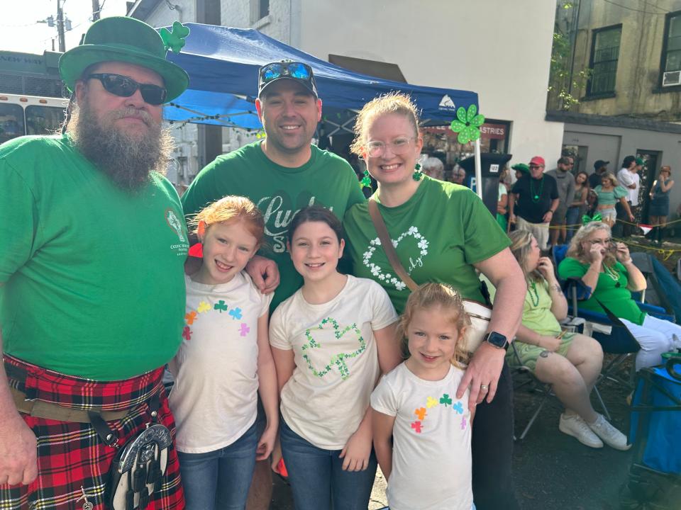 Magan and Adam Dobson (top right) have been bringing their three girls to Savannah’s St. Pats Parade since 2015. Friend and fellow Chatham Artillery Redleg Rick Carson (left) has been coming since 2010.