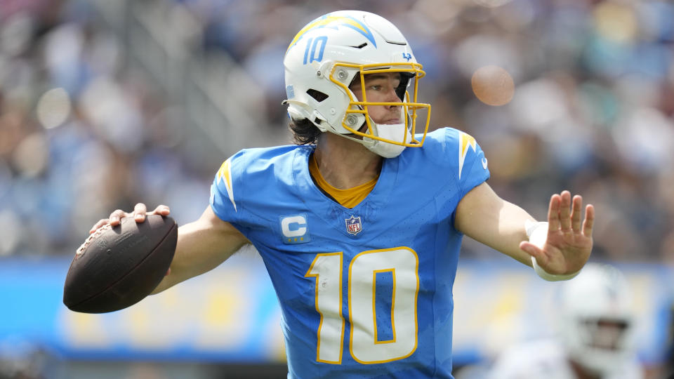 Los Angeles Chargers quarterback Justin Herbert throws against the Miami Dolphins during the first half of an NFL football game Sunday, Sept. 10, 2023, in Inglewood, Calif. (AP Photo/Ashley Landis)