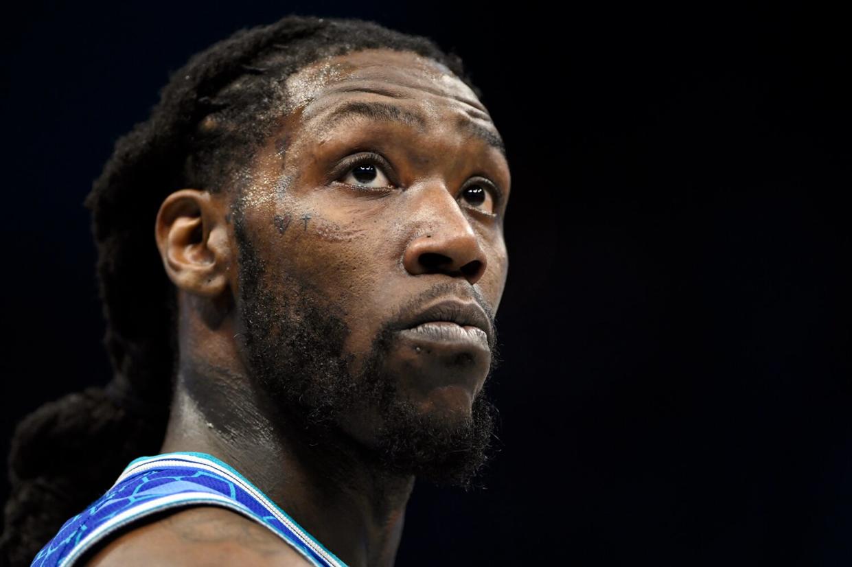 Montrezl Harrell #8 of the Charlotte Hornets stands on the court against the Utah Jazz during the second quarter at Spectrum Center on March 25, 2022 in Charlotte, North Carolina.