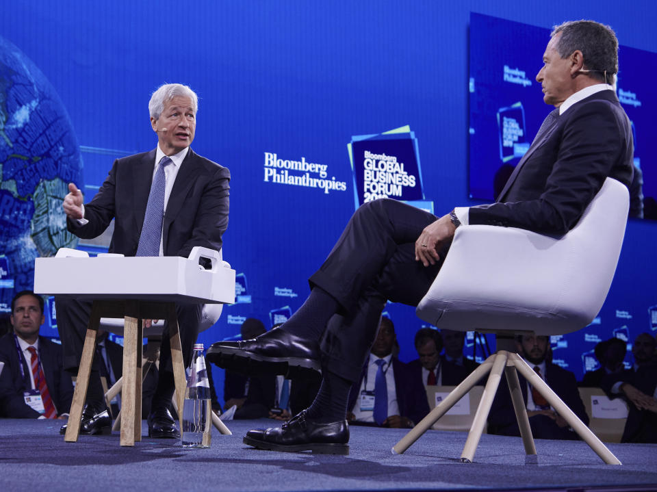 IMAGE DISTRIBUTED FOR BLOOMBERG GLOBAL BUSINESS FORUM-  Jamie Dimon, JPMorgan Chase Chairman and CEO, and Bob Iger, The Walt Disney Company Chairman and CEO, speaking at the 2019 Bloomberg Global Business Forum in New York City on Wednesday, Sept. 25, 2019. (Loren Matthew /AP Images for Bloomberg Global Business Forum)