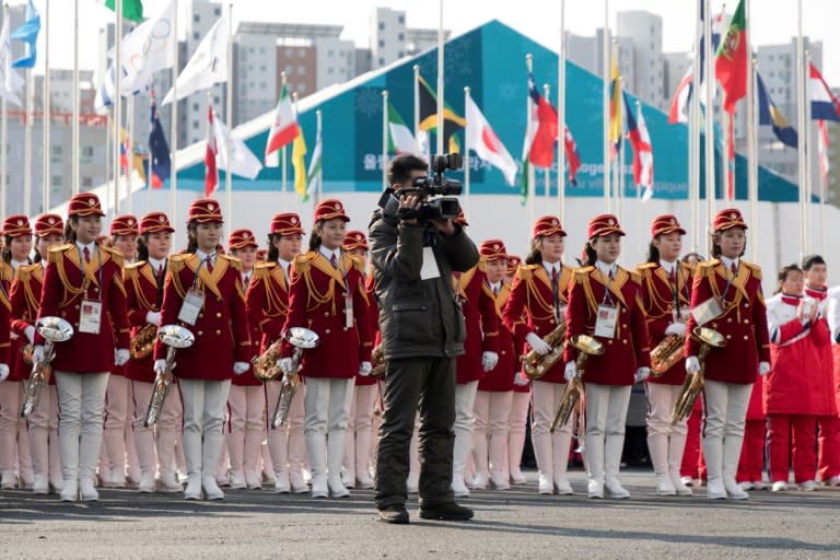 A North Korean cheering band attends a welcoming ceremony for North Korea's athletes at the Olympic Village in Gangneung, on February 8, 2018, ahead of the Pyeongchang 2018 Winter Olympic Games