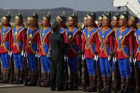 The Mongolian honor guard lines up at Ulaanbaatar's International Airport Chinggis Khaan, Friday, Sept. 1, 2023. Pope Francis is traveling to Mongolia to encourage one of the world's smallest and newest Catholic communities. It's the first time a pope has visited the Asian country and comes at a time when the Vatican's relations with Mongolia's two powerful neighbors, Russia and China, are once again strained. (AP Photo/Ng Han Guan)