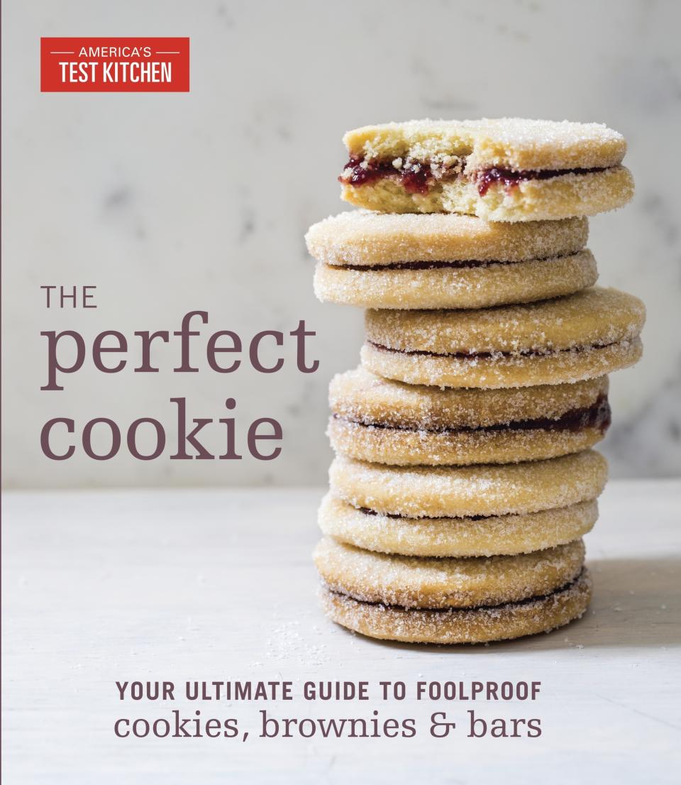 This image provided by America's Test Kitchen in October 2018 shows the cover for the cookbook "The Perfect Cookie." It includes a recipe for Foolproof Holiday Cookies. (America's Test Kitchen via AP)