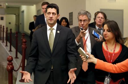 U.S. Representative Paul Ryan (R-WI) talks to reporters as he walks at the end of the day of the House Freedom Caucus meeting on Capitol Hill in Washington October 21, 2015. REUTERS/Yuri Gripas