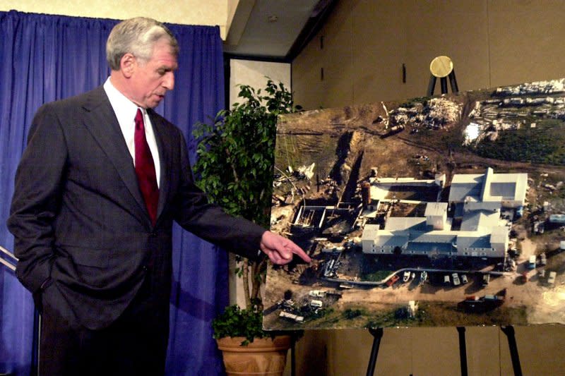 Special counsel and former U.S. Sen. John C. Danforth points to where shell casings were found at the Branch Davidian compound, in Waco, Texas, during a news conference July 21, 2000. On February 28, 1993, federal agents attempting to serve warrants on the Branch Davidian compound near Waco, Texas, were met with gunfire that left five dead. File Photo by Bill Greenblatt/UPI