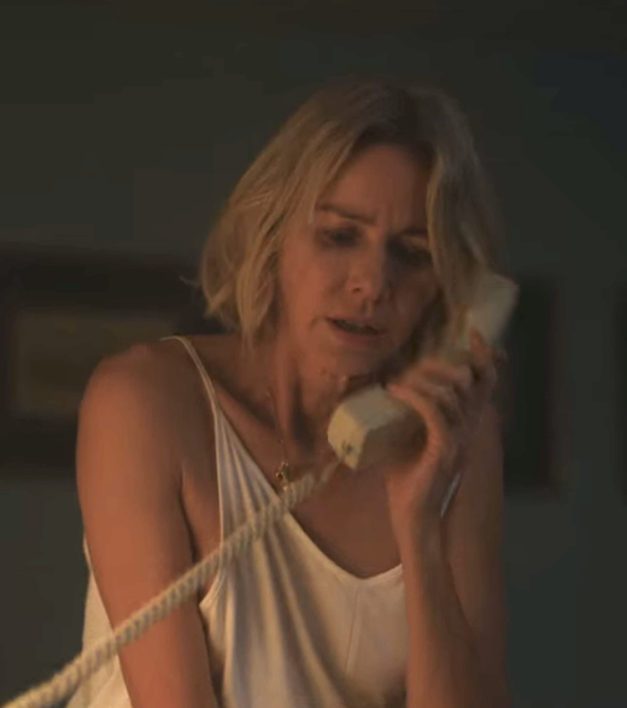 An upset-looking Watts in "The Watcher" on the phone