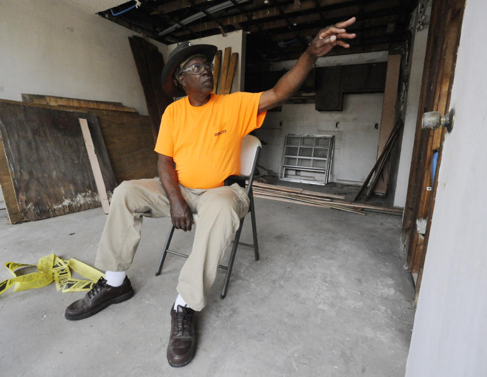 Project superintendent James Poindexter sits in a gutted room at the historic A.G. Gaston Motel during renovation work in Birmingham, Ala., on Wednesday, April 17, 2019. Once featured in the "The Negro Motorist Green Book," the long-closed motel provided a home for Martin Luther King Jr. during civil rights demonstrations in the 1960s. It is is being transformed into the centerpiece of a new national civil rights monument. (AP Photo/Jay Reeves)
