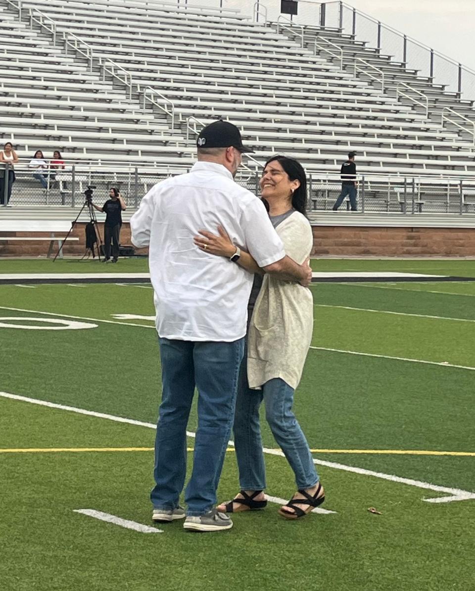 Dr.  John Kuhn, Abilene ISD superintendent, dances with his wife Noelia during the Mineral Wells ISD Multicultural Night on April 25, 2024. The event was his final participation as Mineral Wells ISD superintendent before starting in Abilene.