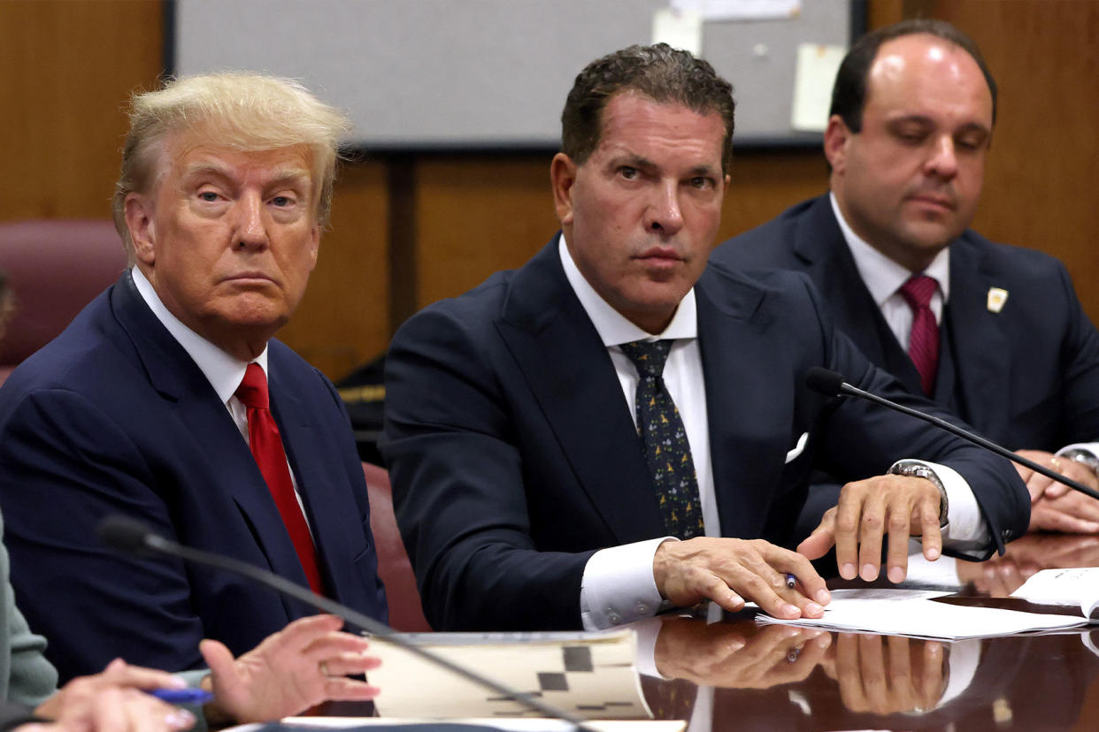 Donald Trump; Joe Tacopina; Boris Epshteyn Andrew Kelly-Pool/Getty Images