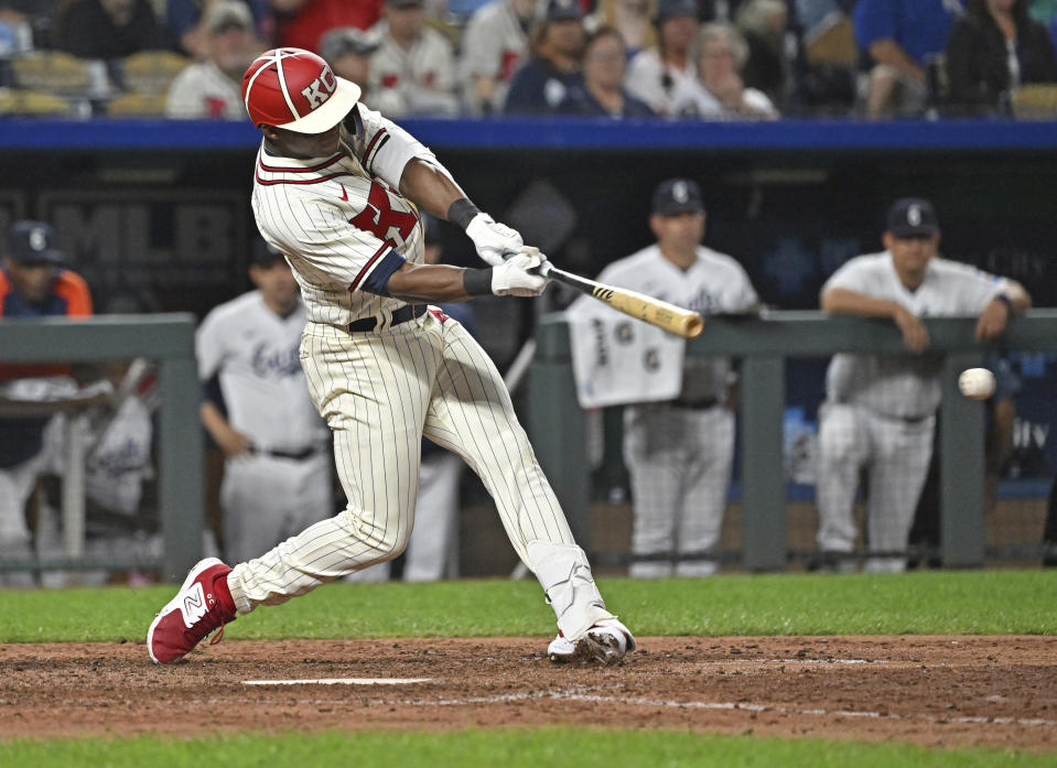 Kansas City Royals' Dairon Blanco singles in a run during the seventh inning of a baseball game against the Houston Astros, Saturday, Sept. 16, 2023, in Kansas City, Mo. (AP Photo/Peter Aiken)