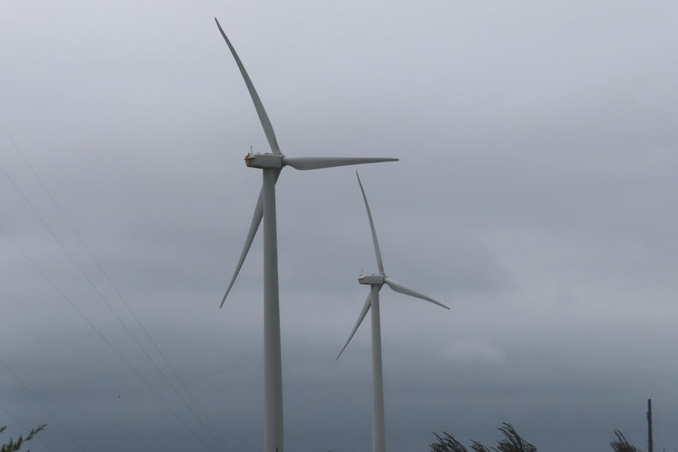 Land-based wind turbines spin in Atlantic City, N.J., on Wednesday, Sept. 18, 2024. (AP Photo/Wayne Parry)