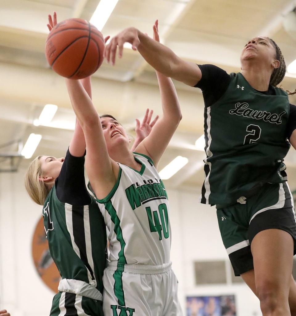 Laurel's Saniyah Hall, right, had the game-winning assist in the Gators' 53-52 win over Fairland in the first Division II state semifinal