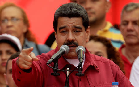 Venezuela's President Nicolas Maduro gives a speech at a rally against U.S President Donald Trump in Caracas, Venezuela August 14, 2017. REUTERS/Ueslei Marcelino