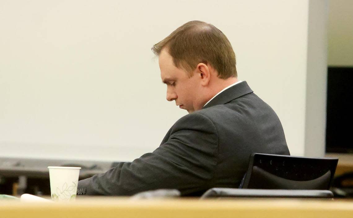 Aaron Dean sits by himself after a jury found him guilty Thursday of manslaughter for fatally shooting Atatiana Jefferson while on duty as a Fort Worth police officer. His attorneys argued he fired in self-defense.