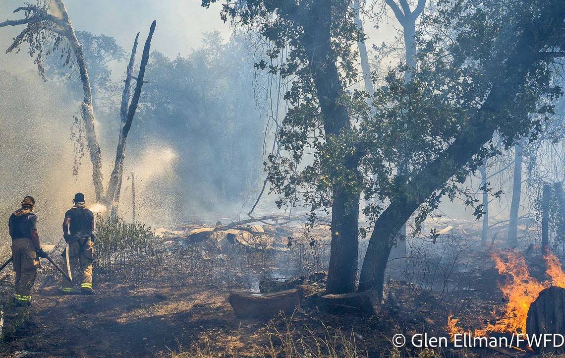 While the temperatures in Dallas-Fort Worth broke record highs at 109 on Tuesday afternoon, the Fort Worth Fire Department responded to a three-alarm grass fire on the westbound side of Interstate 30 just east of East Loop 820 in east Fort Worth.