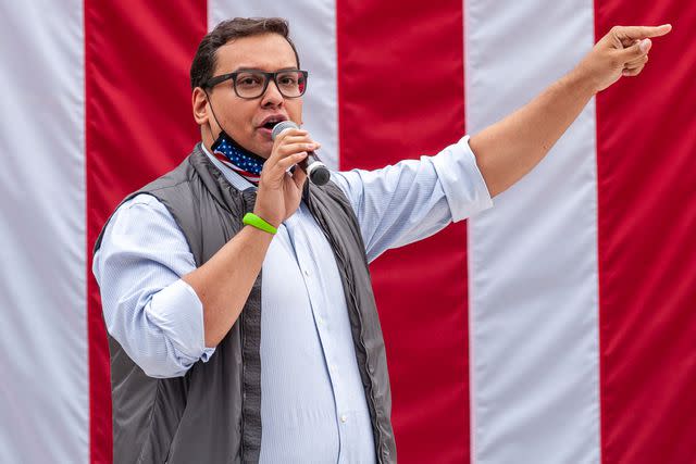 Sipa via AP Images Then-congressional candidate George Santos speaks to Trump supporters at an America First rally in Ronkonkoma, New York, on Oct. 11, 2020