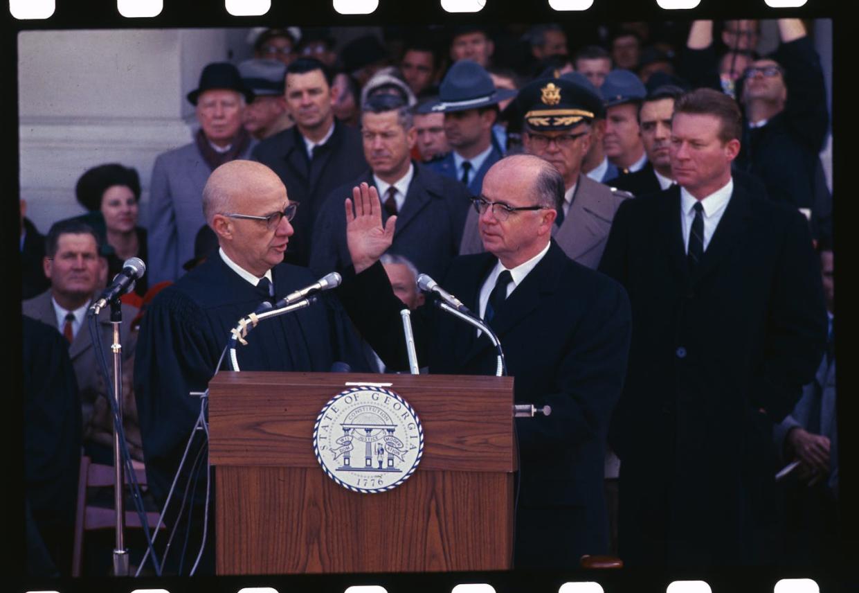 Lester Maddox is sworn in as governor of Georgia on Jan. 11, 1967. <a href="https://www.gettyimages.com/detail/news-photo/lester-maddox-is-sworn-in-as-governor-of-georgia-outside-news-photo/517825372?adppopup=true" rel="nofollow noopener" target="_blank" data-ylk="slk:Bettmann/Getty Images;elm:context_link;itc:0;sec:content-canvas" class="link ">Bettmann/Getty Images</a>