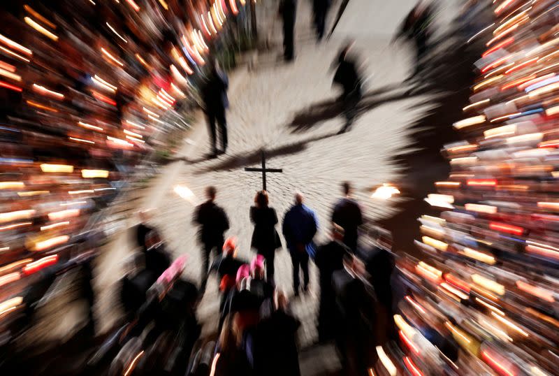 FILE PHOTO: Pope Francis leads the Via Crucis procession at Rome's Colosseum