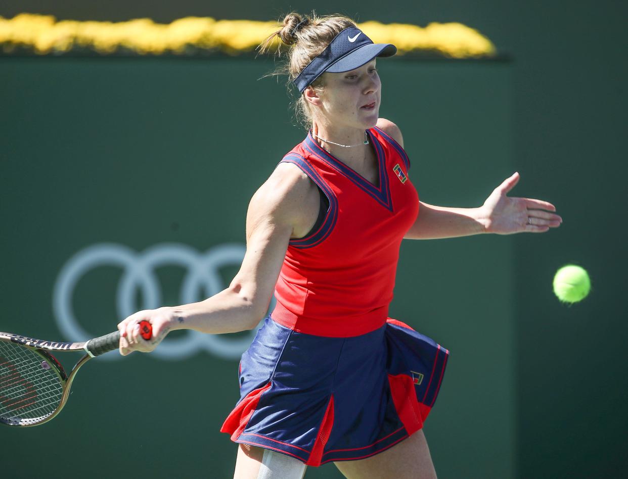 Elina Svitolina hits in her match against Jessica Pegula at the BNP Paribas Open in Indian Wells, Tuesday, October 12, 2021.