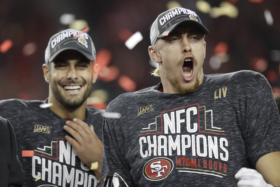 San Francisco 49ers quarterback Jimmy Garoppolo, left, and tight end George Kittle celebrate after the NFL NFC Championship football game against the Green Bay Packers Sunday, Jan. 19, 2020, in Santa Clara, Calif. The 49ers won 37-20 to advance to Super Bowl 54 against the Kansas City Chiefs. (AP Photo/Ben Margot)