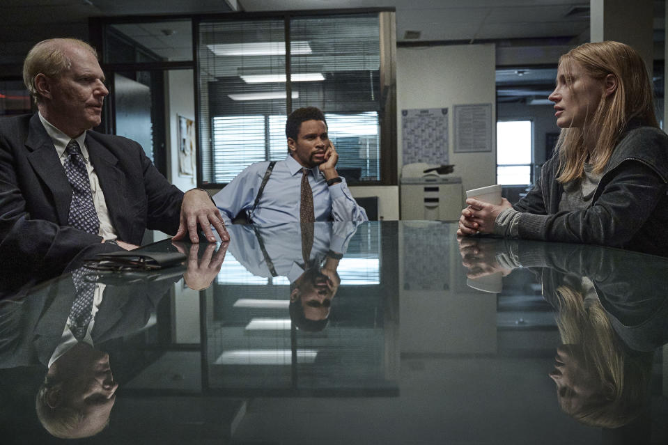 This image released by Netflix shows Noah Emmerich, from left, Nnamdi Asomugha and Jessica Chastain in a scene from "The Good Nurse." (JoJo Whilden/Netflix via AP)