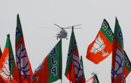 India's Prime Minister Narendra Modi arrives in an Indian Air Force helicopter to address an election campaign rally in Meerut in the northern Indian state of Uttar Pradesh, India, March 28, 2019. REUTERS/Adnan Abidi