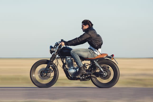 Man riding motorcycle on the highway.