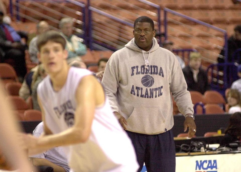 Florida Atlantic coach Sidney Green watches his team practice at the Bi-Lo Center in Greenville, S.C. Wednesday, March 13, 2002.  Florida Atlantic played Alabama in the first round of the NCAA tournament.