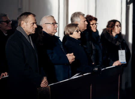 European Council President Donald Tusk, former Polish President Lech Walesa, former first lady Danuta Walesa, former Polish President Aleksander Kwasniewski and former first lady Jolanta Kwasniewska attend a funeral service for the city's mayor Pawel Adamowicz at St Mary's Basilica in Gdansk, Poland January 19, 2019. Agencja Gazeta/Bartosz Banka via REUTERS