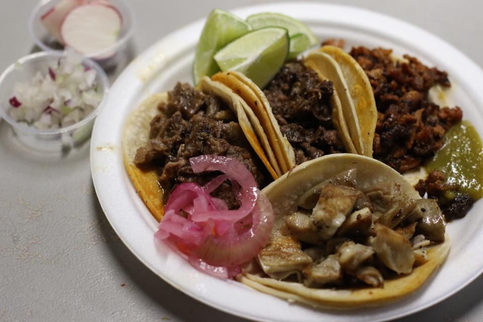 Four types of tacos at Lonchera La Guadalupana, practically overflowing, on Oct. 2, 2018.