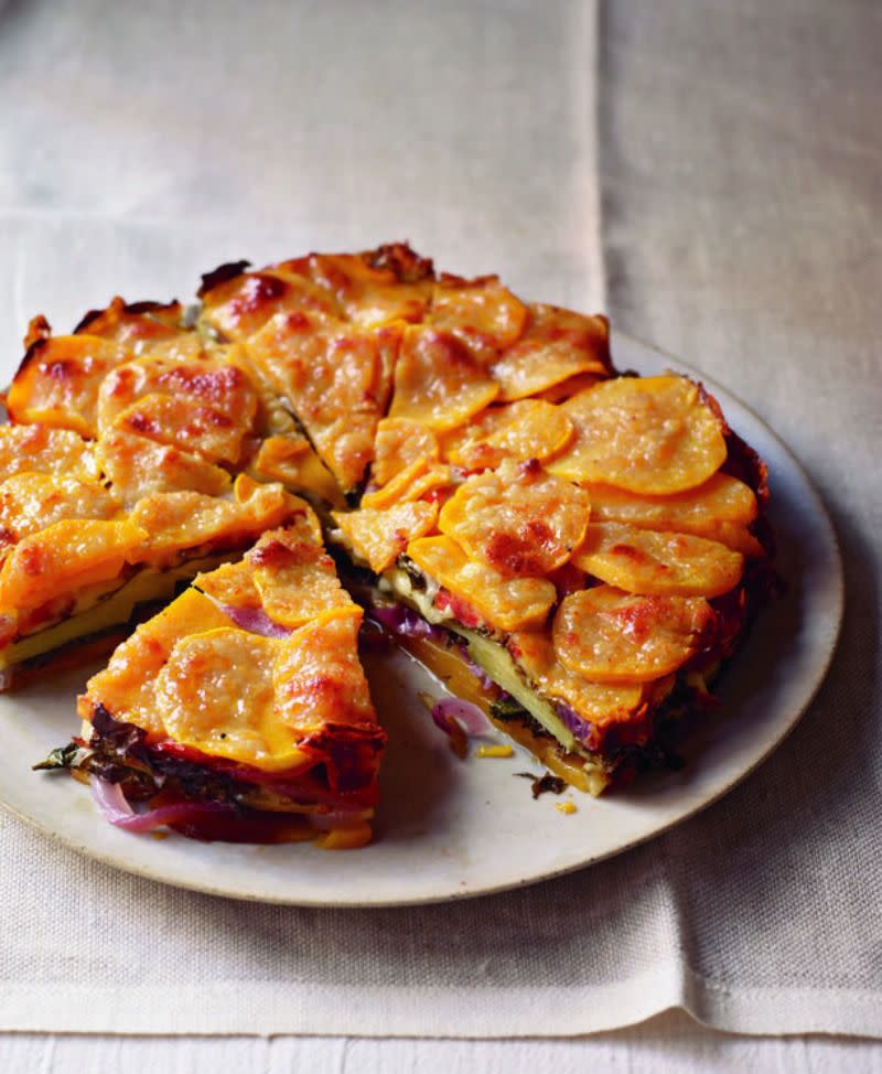 <p>This is how vegetarian fare should taste; layered like lasagna with flavorful vegetables and nutty cheese. If the torte feels too fancy, prepare it casserole-style in a baking dish and serve by scooping out portions.</p><p><a rel="nofollow noopener" href="https://www.womansday.com/food-recipes/food-drinks/recipes/a11296/butternut-squash-kale-torte-recipe-124667/" target="_blank" data-ylk="slk:Get the recipe.;elm:context_link;itc:0;sec:content-canvas" class="link "><strong>Get the recipe.</strong></a> </p>