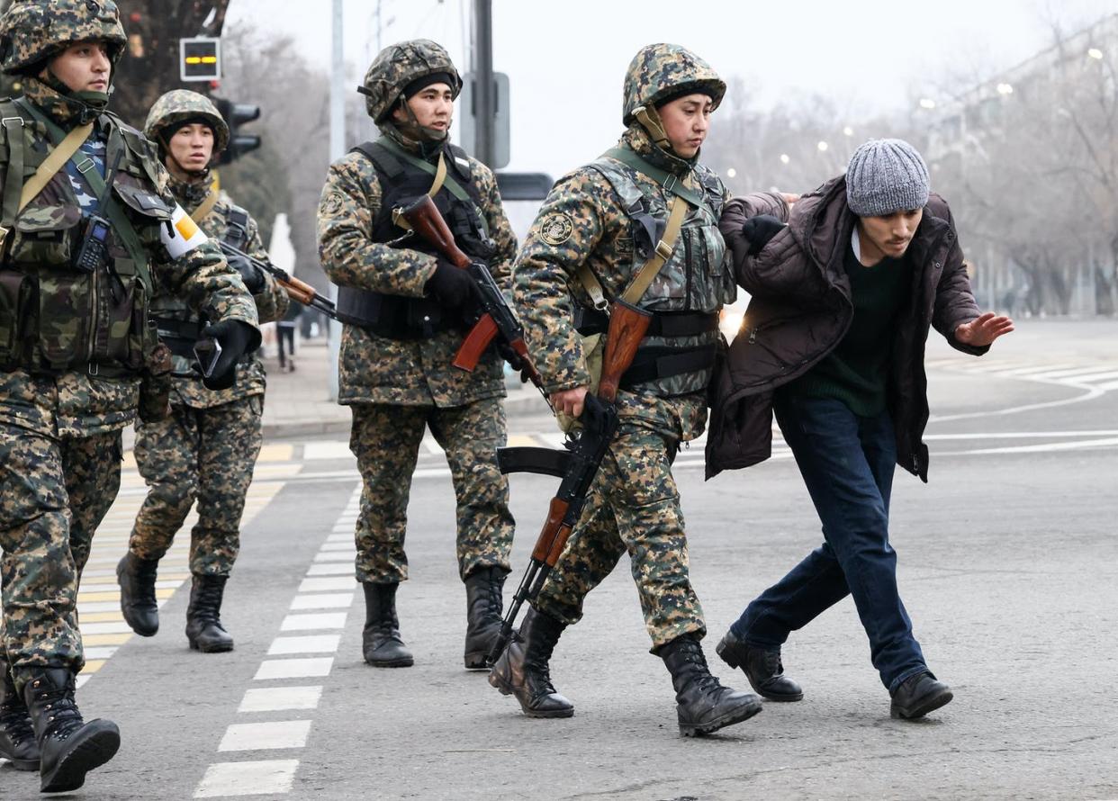 <span class="caption">A military patrol detains a protester in Kazakhstan.</span> <span class="attribution"><a class="link " href="https://www.gettyimages.com/detail/news-photo/military-patrol-detains-a-man-on-nazarbayev-street-a-rise-news-photo/1237647167?adppopup=true" rel="nofollow noopener" target="_blank" data-ylk="slk:Valery Sharifulin\TASS via Getty Images);elm:context_link;itc:0;sec:content-canvas">Valery Sharifulin\TASS via Getty Images)</a></span>