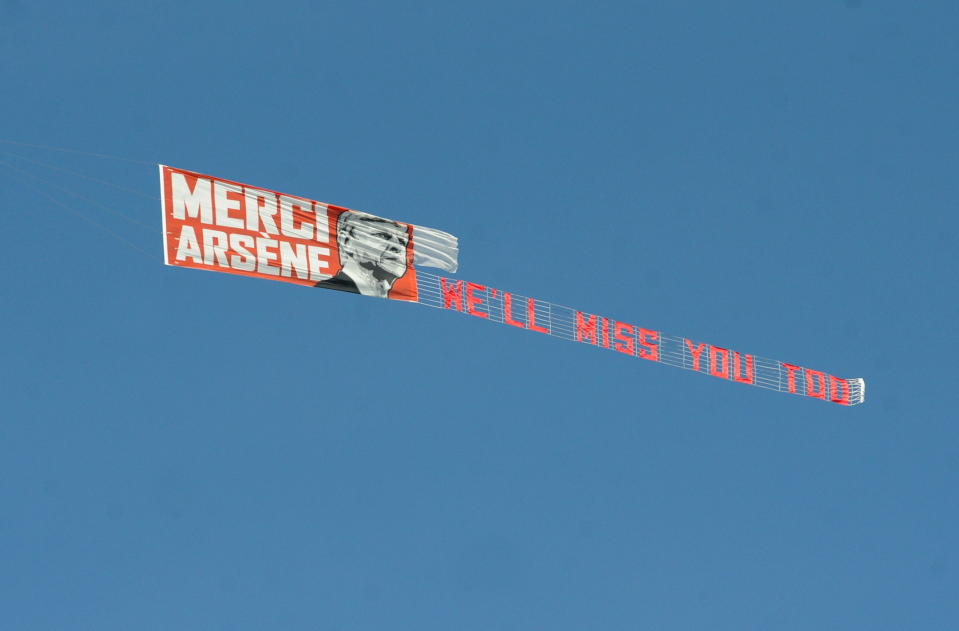 Arsene Wenger was thanked in a banner flown in the skies as his reign at Arsenal finally ended.