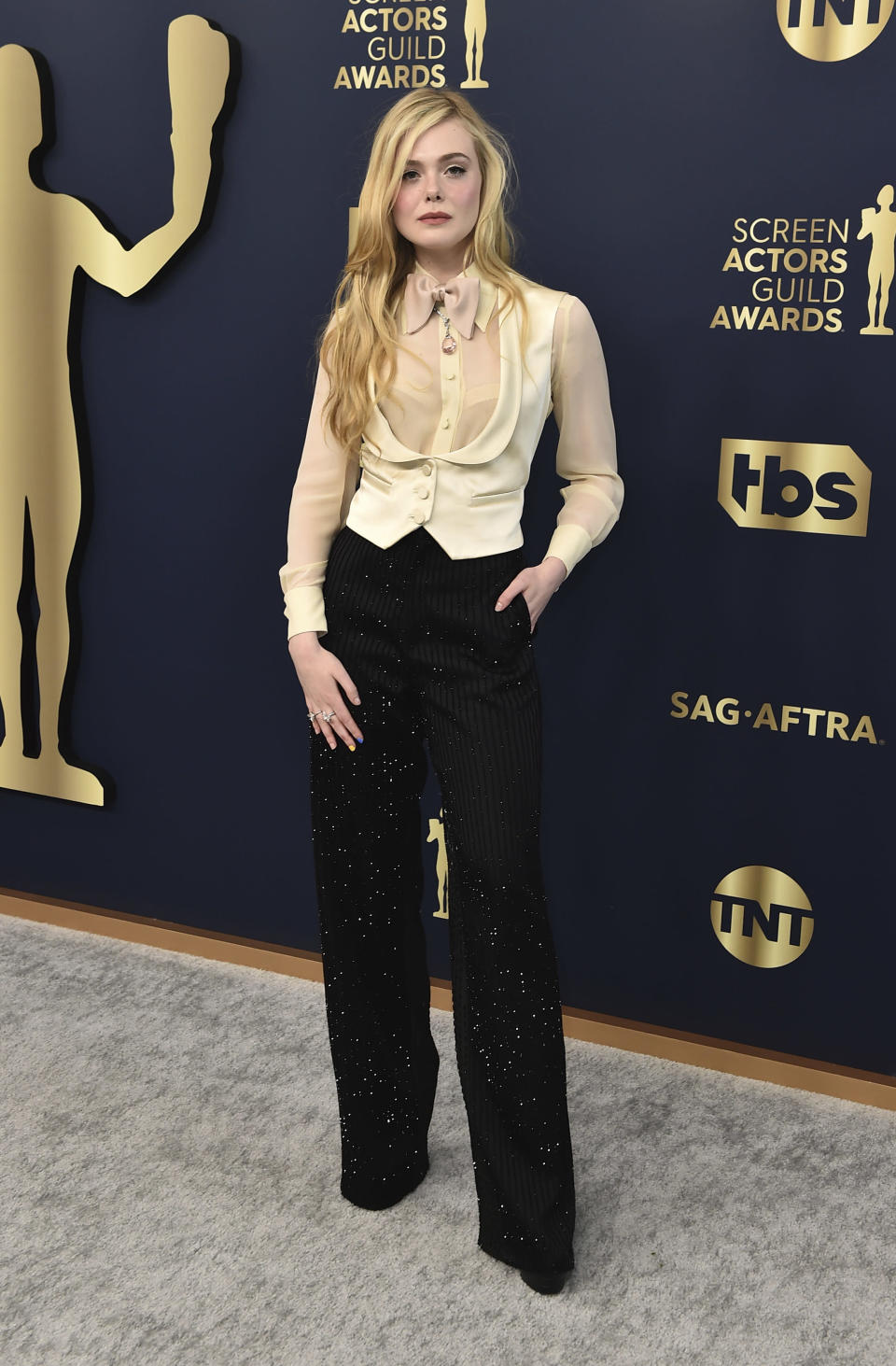 Elle Fanning arrives at the 28th annual Screen Actors Guild Awards at the Barker Hangar on Sunday, Feb. 27, 2022, in Santa Monica, Calif. (Photo by Jordan Strauss/Invision/AP)